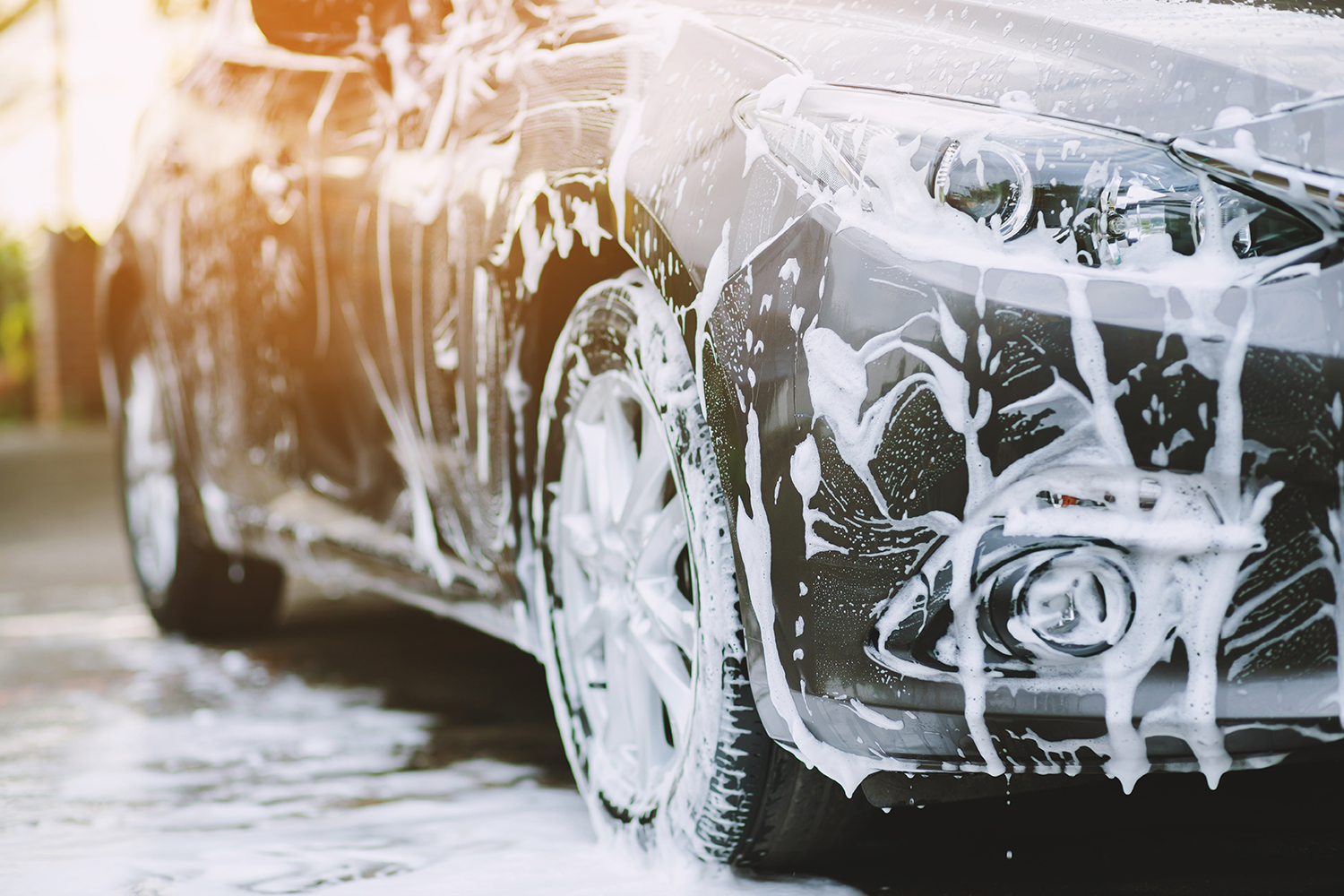 a black car being washed.